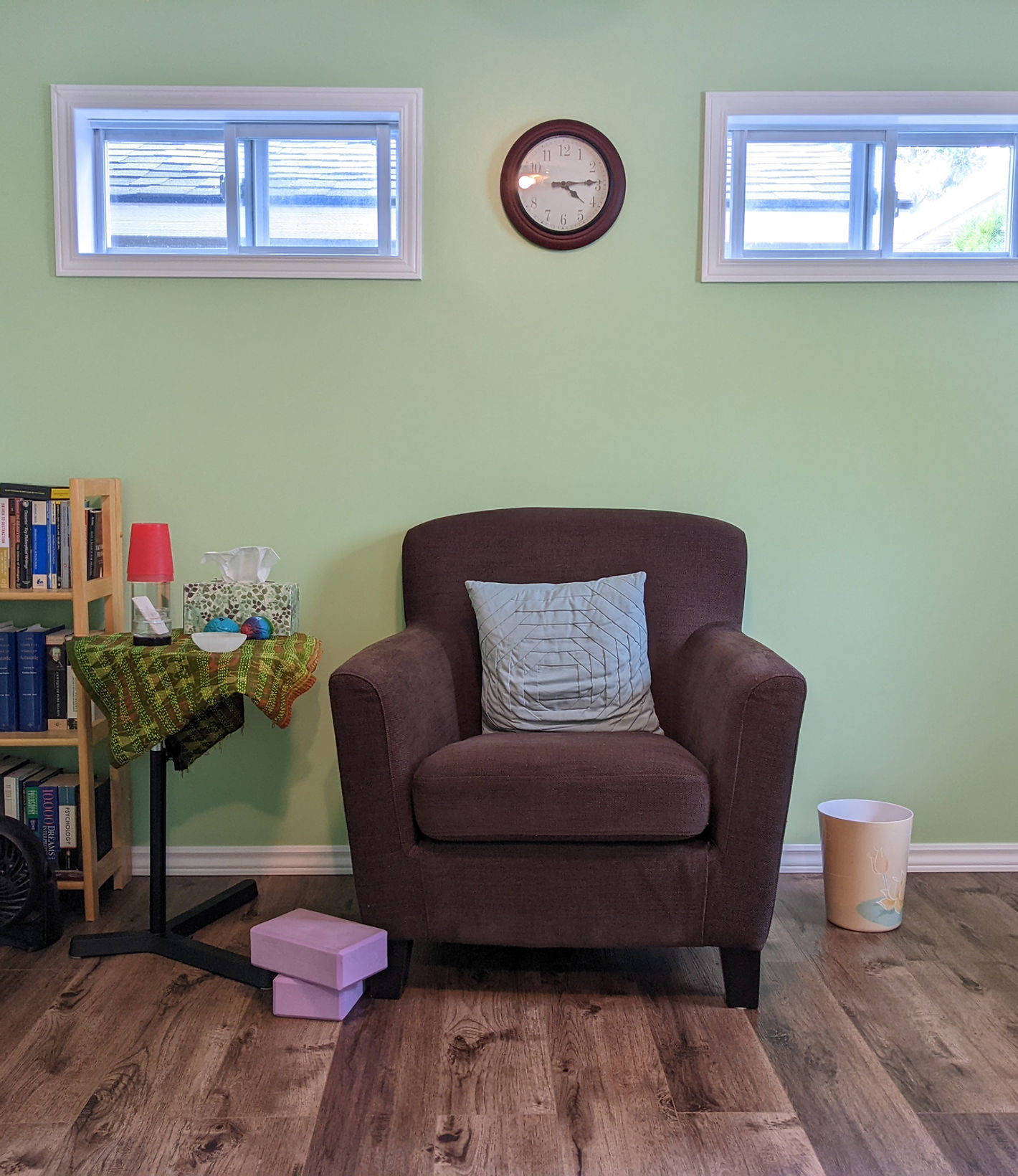 Comfy chair in a light green room