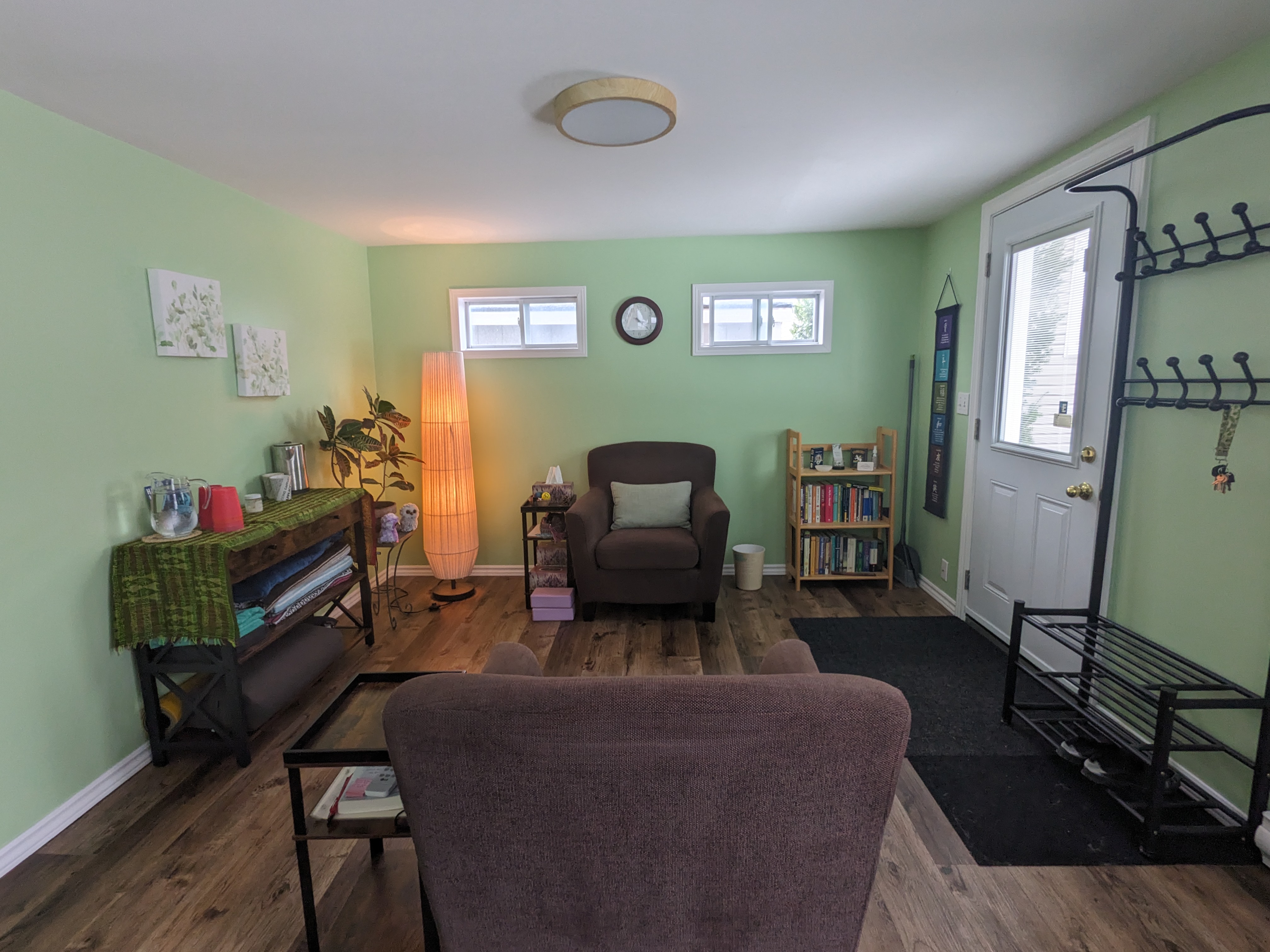 Comfy chair in a light green room