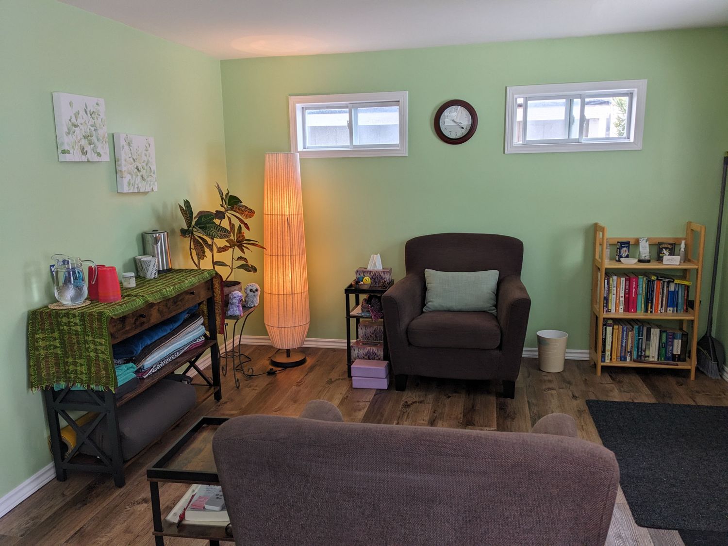Comfy chair in a light green room
